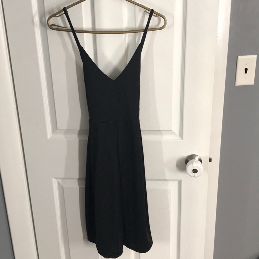 Black sexy sundress with pockets and cross back